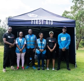 The QuickFix team The QuickFix team in front of their first aid tent