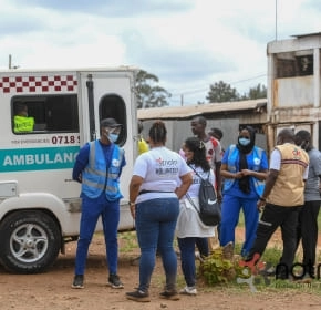 Event first aid cover QuickFix team providing first aid cover alongside an ambulance at an outdoor event